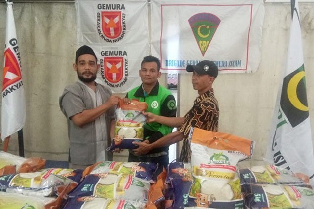Gemura GPI Peduli Pekerja Harian Dengan Membagikan Beras Premium